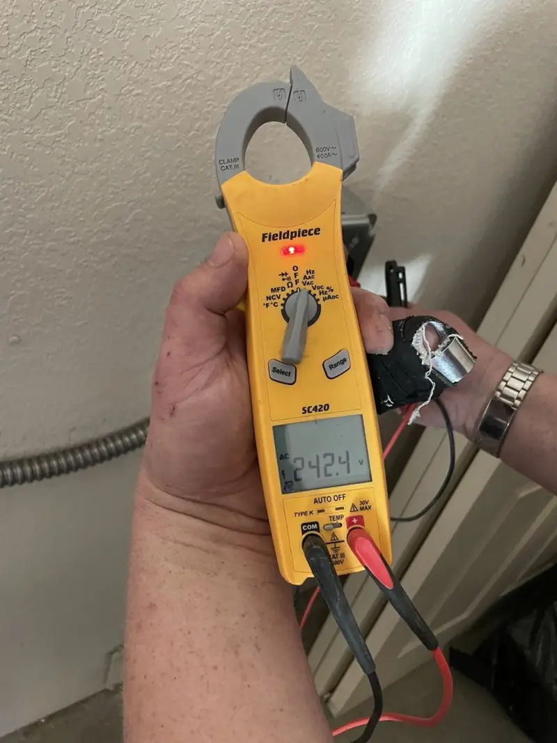 Voltage testing with clamp meter during Whole House Surge Protector in Orrville